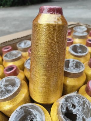 Matériau à cône de 125 g 100% Polyester Broderie métallique Fils de type MS Or pur 150D 120D pour le tricot