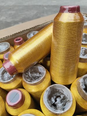Matériau à cône de 125 g 100% Polyester Broderie métallique Fils de type MS Or pur 150D 120D pour le tricot